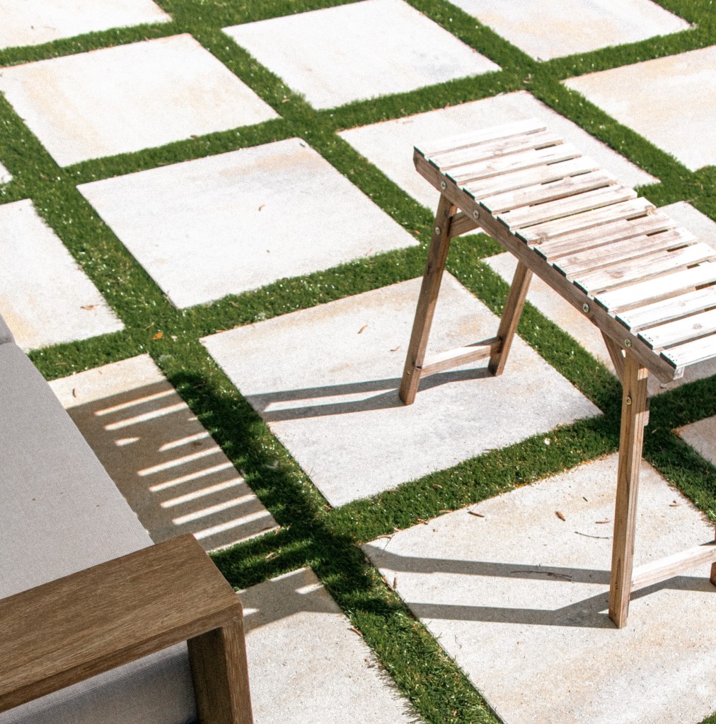 Photo of white stepping stones placed on top of turf