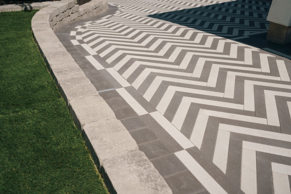 Photo of grey and white pavers with triple border